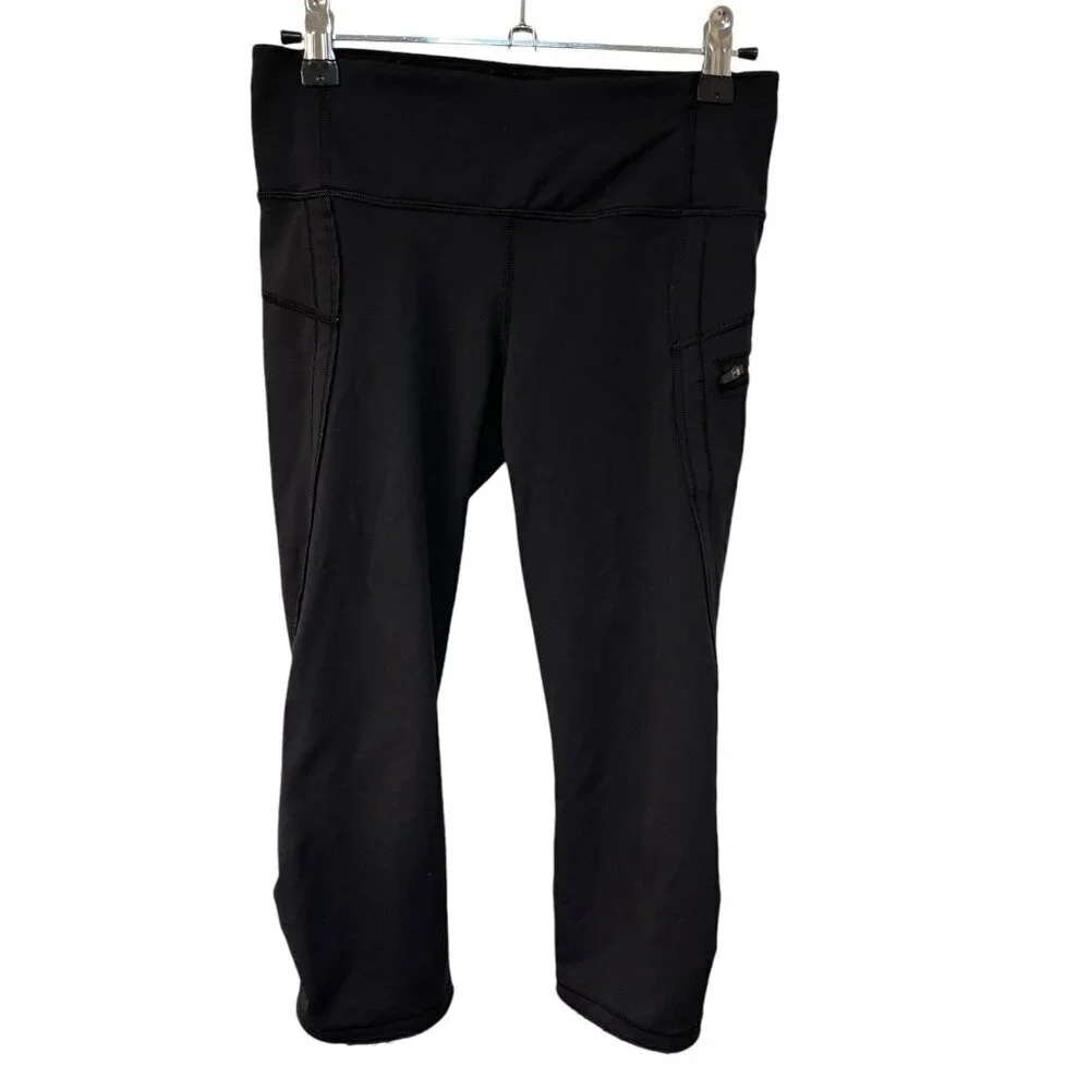 LULULEMON ATHLETICA BLACK SIDE ZIPPER POCKET CROP LEGGINGS SIZE 4 CAPRI
